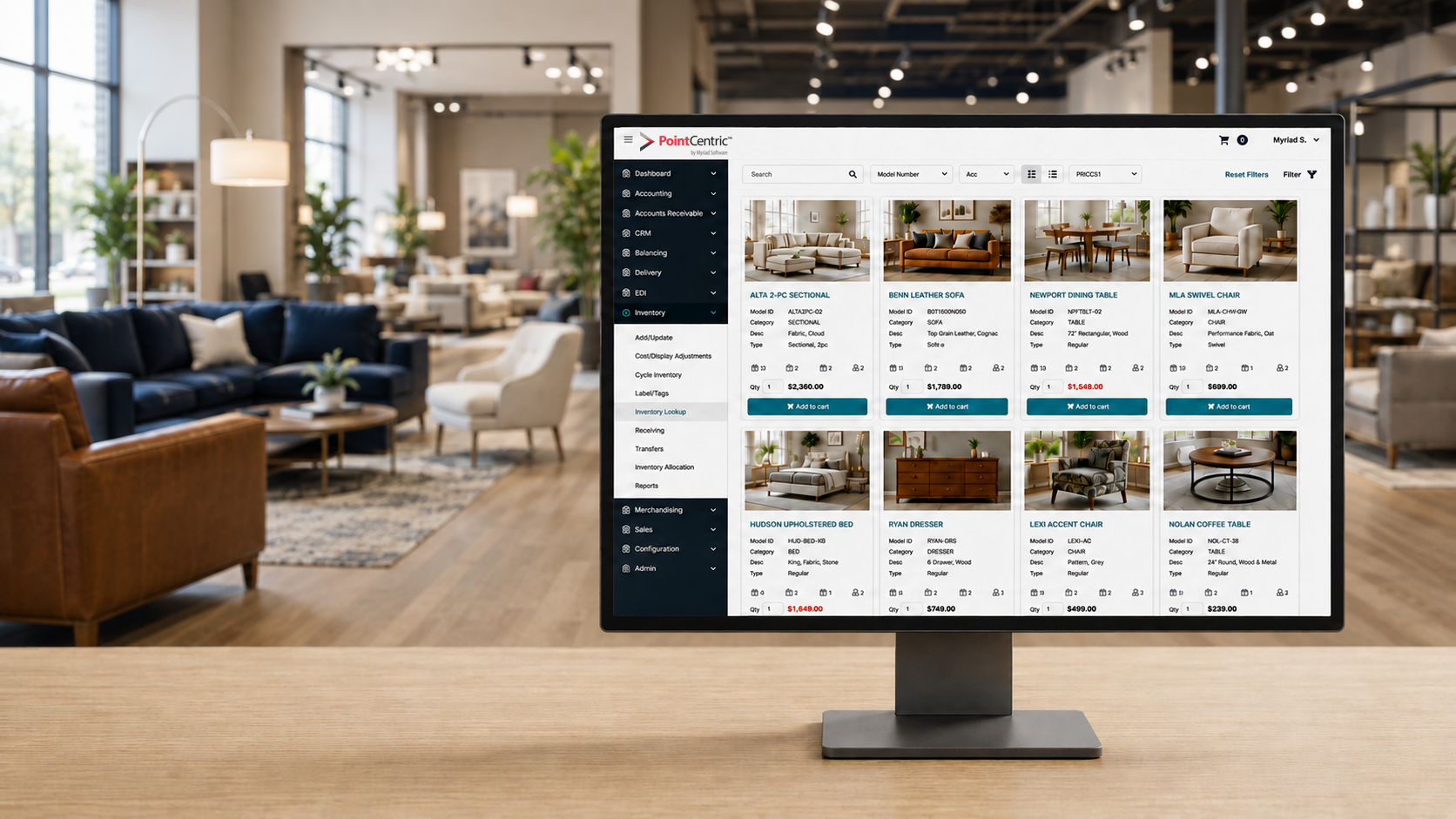 Computer showing PointCentric platform on a table in a furniture store